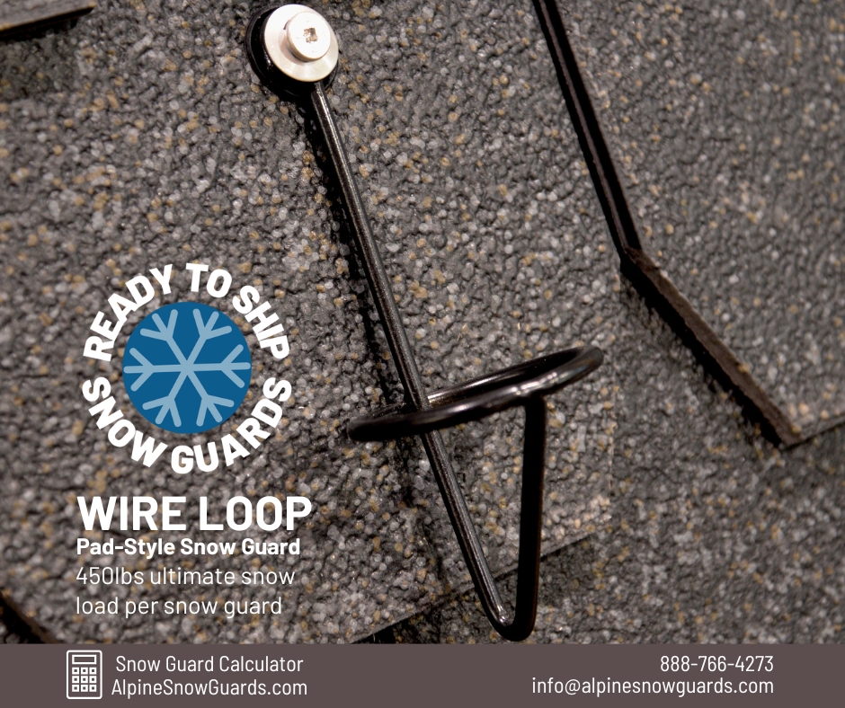 A single matte black Wire Loop snow guards, designed by Alpine SnowGuards, shown installed on synthetic slate.
